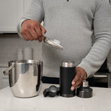 Ice being added to toddy go brewer