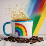 Image of a coffee cup with coffee splashing out of it, with a rainbow on the cup and coffee beans around it